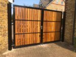 Modern Estate Gate with vertical cladding