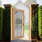 Pedestrian Side Gate in Oak - Flat top with black vertical spindles - The Ivybridge - open